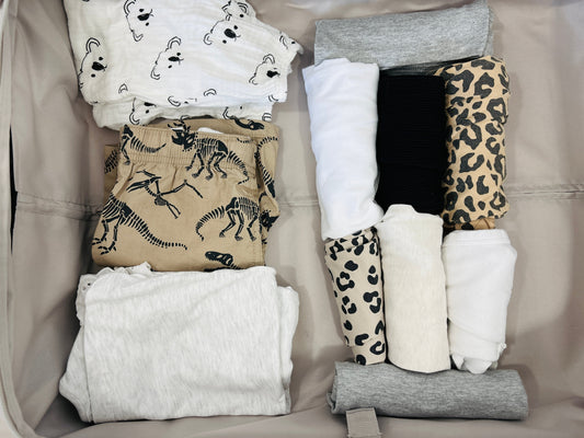 Travel Suitcase Clothes Folded and Rolled
