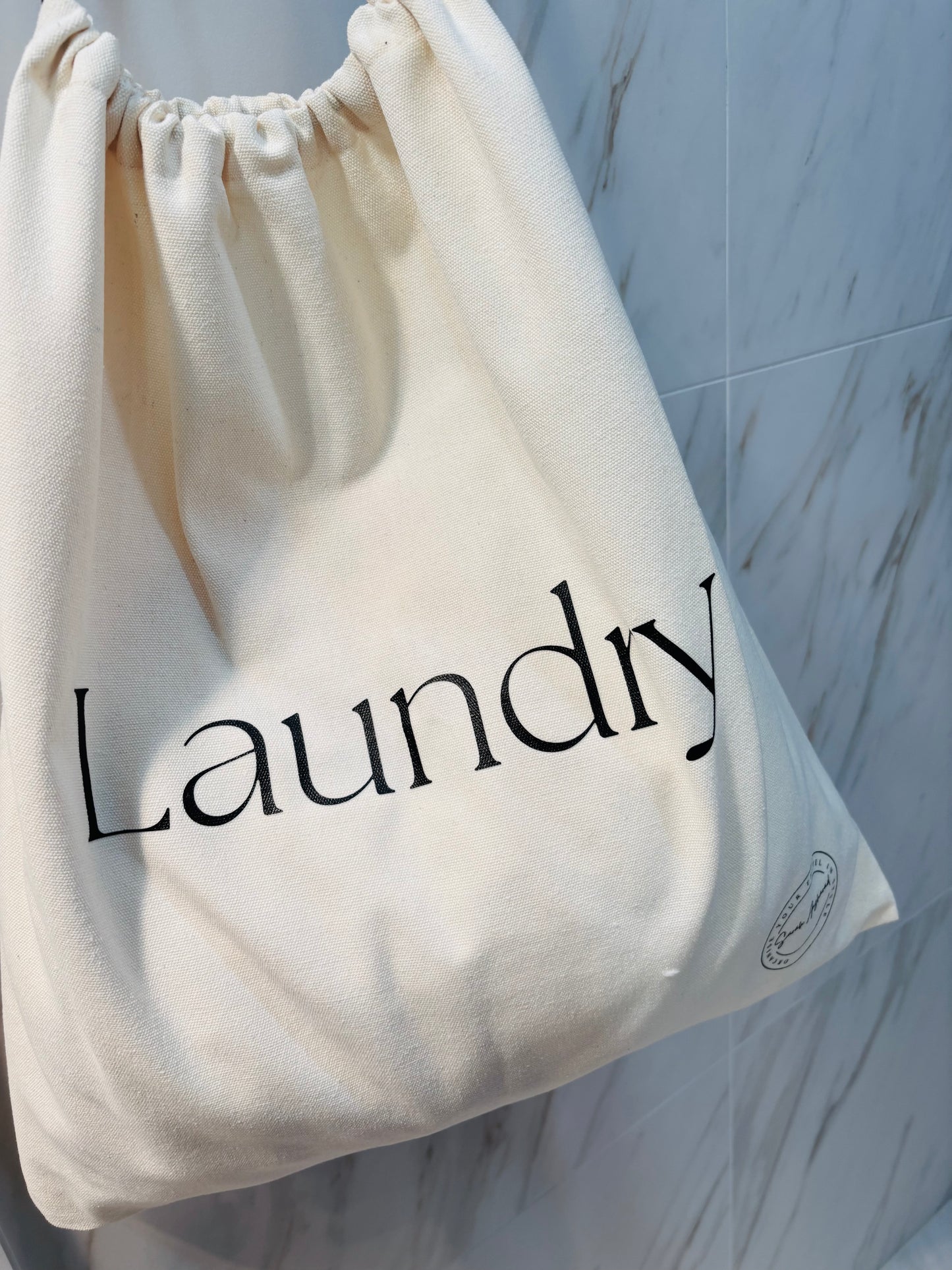 Cream cotton canvas laundry bag – travel organiser hanging zoomed view