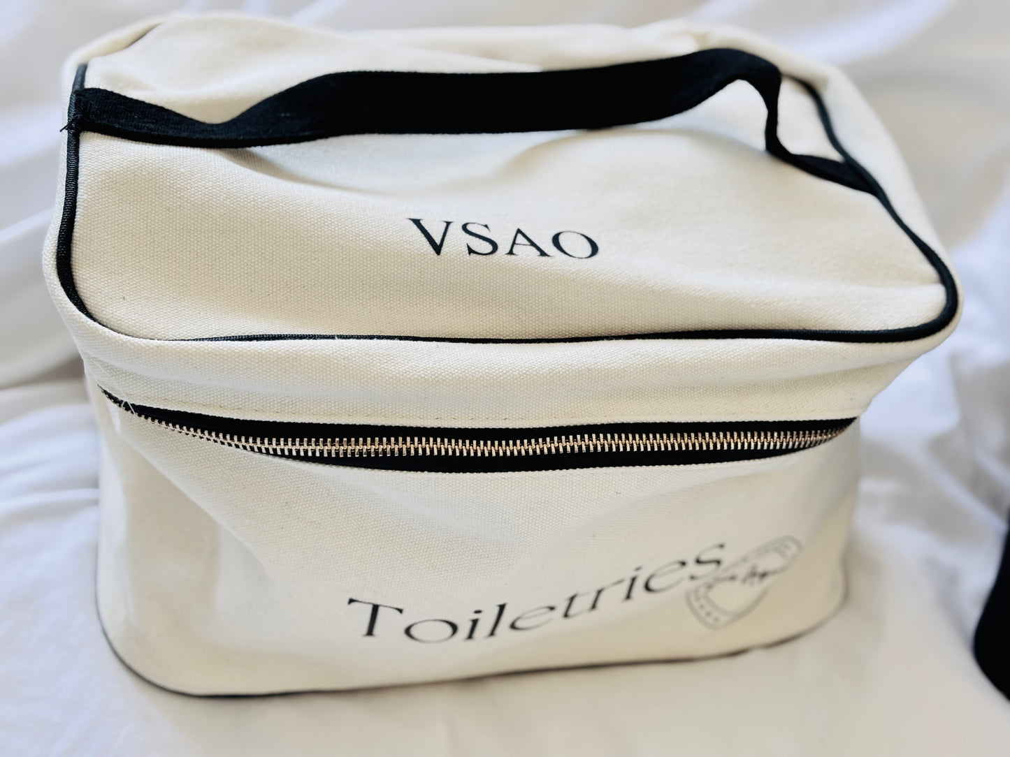 Cream Toiletries bag with initials personalised on the top